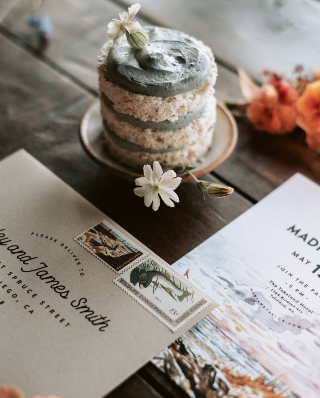 Save the date design pairing watercolor washes with script type